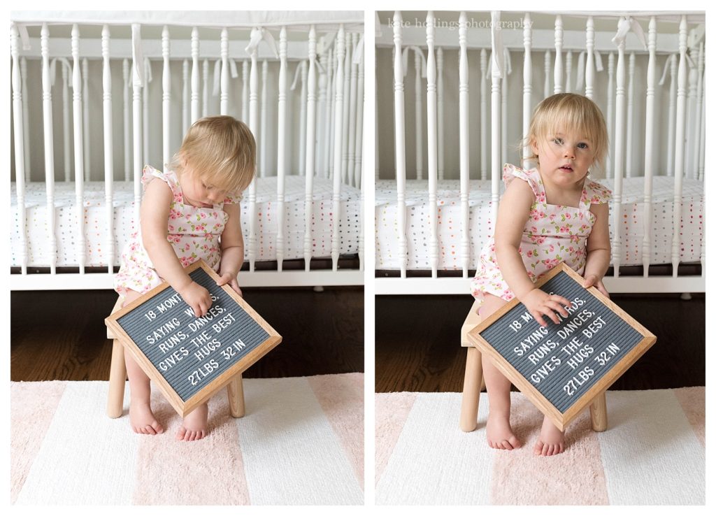 Toddler holds her letterboard