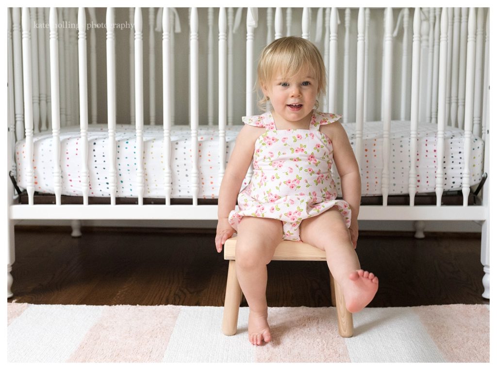 Baby girl kicks on her stool