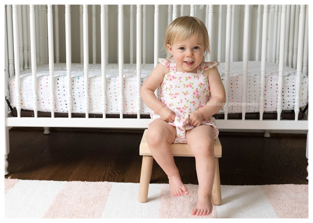 Toddler sits on her stool
