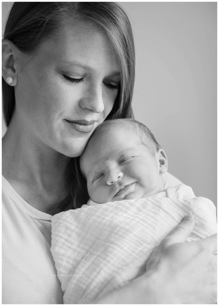 black and white portrait of mother and newborn