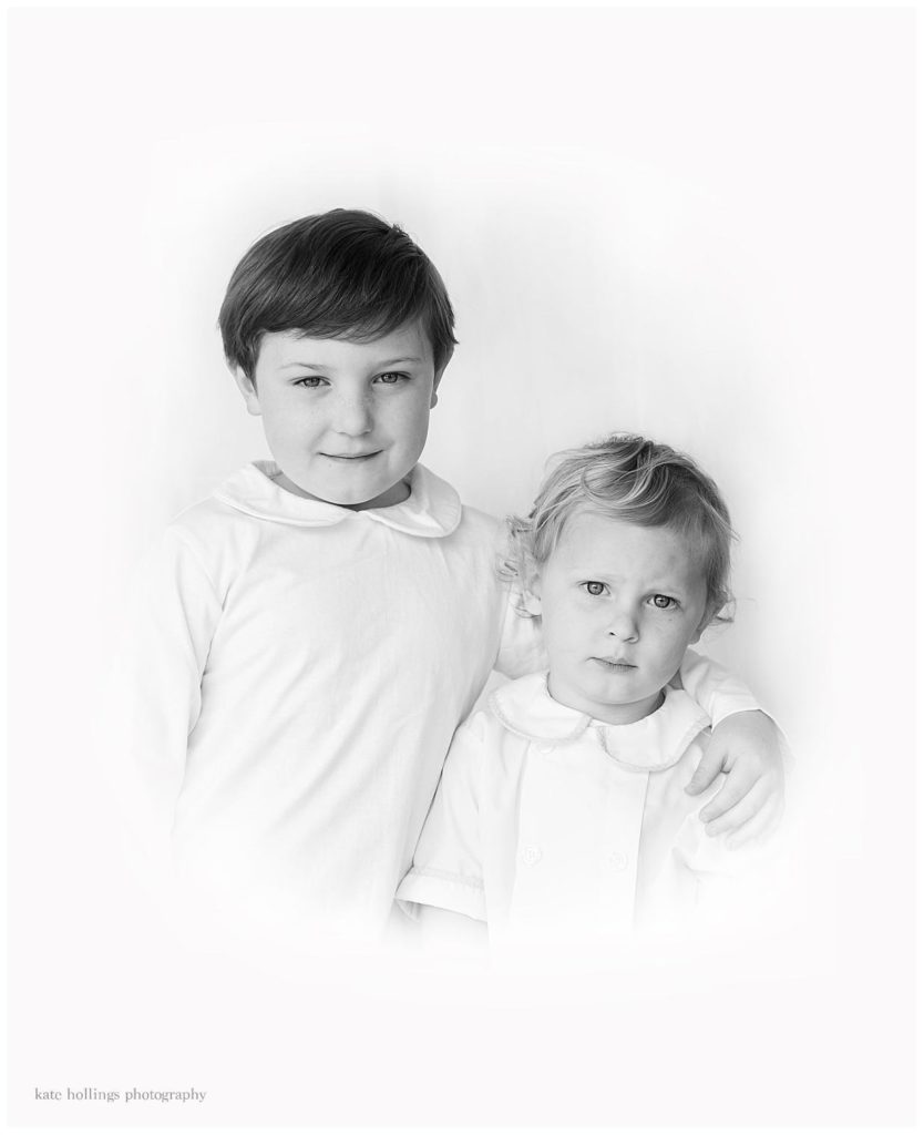 black and white sibling portrait